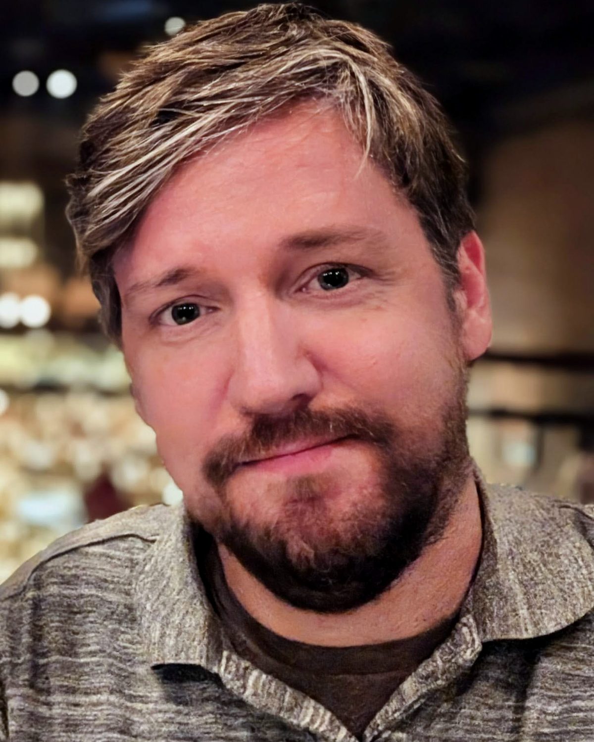 Ryan Anderson, photographed indoors in warm evening light.